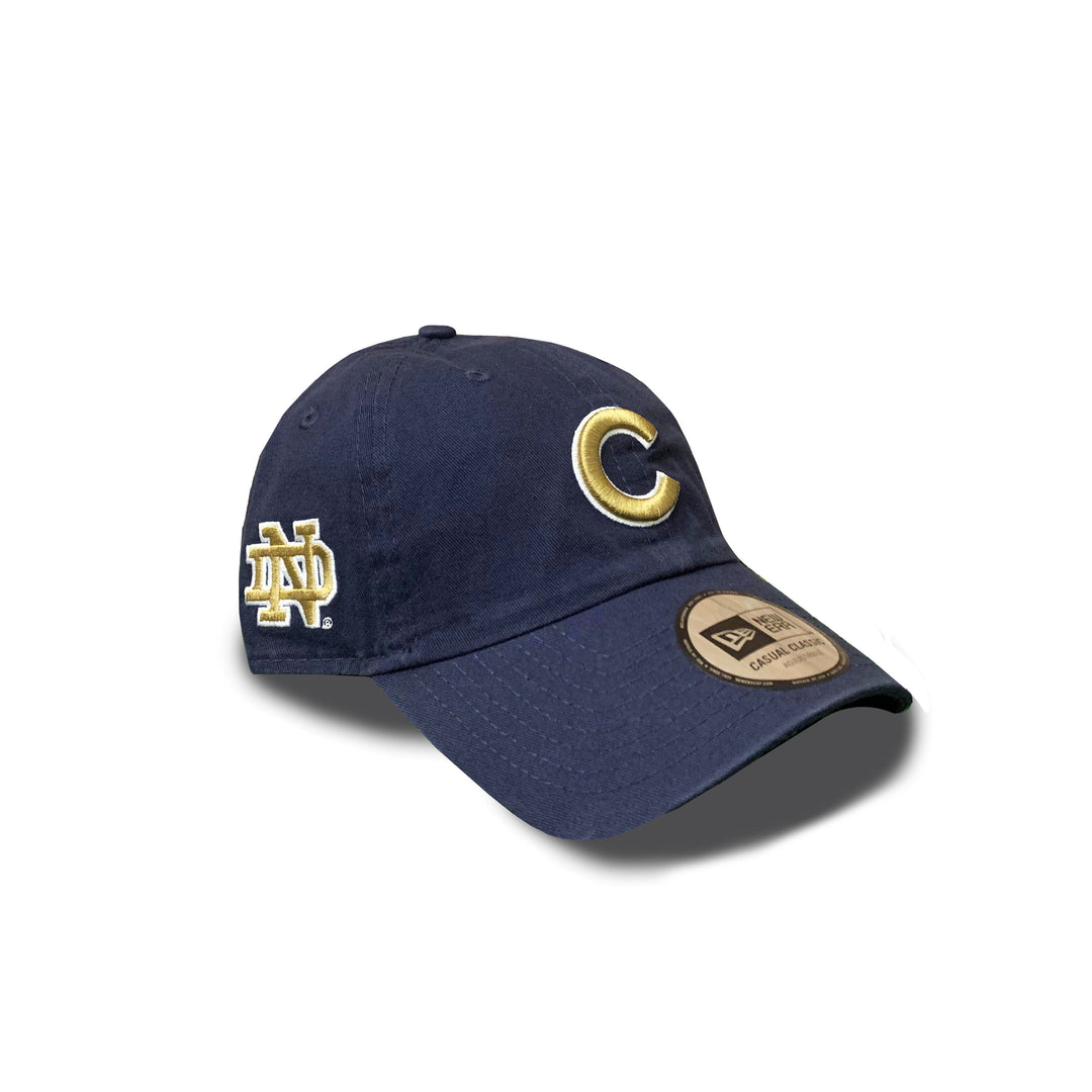 CHICAGO CUBS AND UNIVERSITY OF NOTRE DAME NEW ERA NAVY ADJUSTABLE CAP Caps Ivy Shop